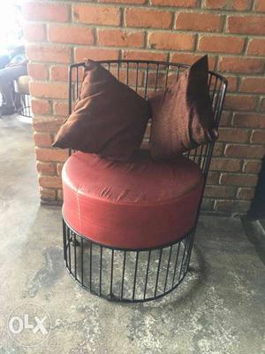 Brown Cuddle Chair With Throw Pillows