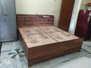 Brown Wooden Panel Bed