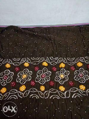 Brown, Yellow, And Maroon Floral Textile