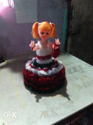 Girl Doll In White And Red Knitted Dress