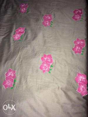 Grey And Pink Floral Textile