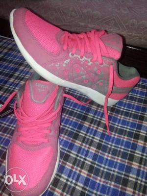 Ladies Pair Of Pink Sneakers 