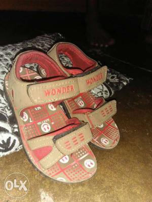 Pair Of Brown-and-red Wonder Sandals