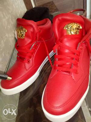 Pair Of Red Versace High Top Sneakers