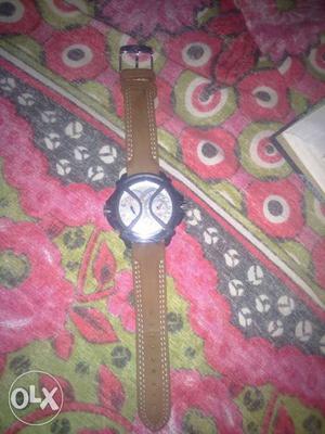 Round Black Wrist Watch With Brown Leather Strap