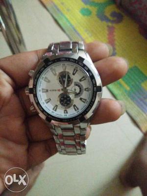 Round White Chronograph Watch With Silver-link Bracelet