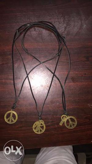 Three Round Gold Peace Pendant Necklaces