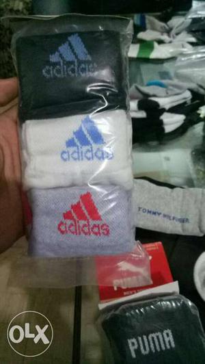 Three White, Grey, And Black Adidas Printed Textiles In Bag