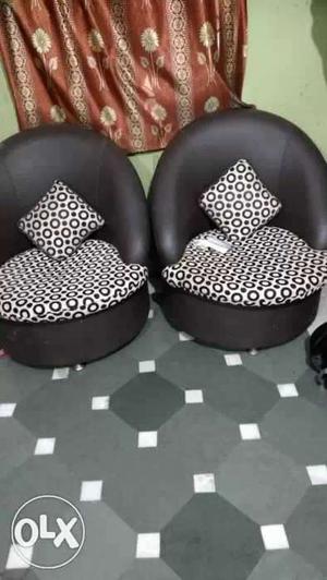 Two Black-and-white Polka Dotted Leather Tub Chairs