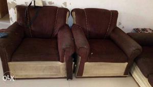 Two Brown Cotton Armchairs