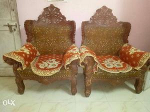 Two Brown Wooden Armchairs