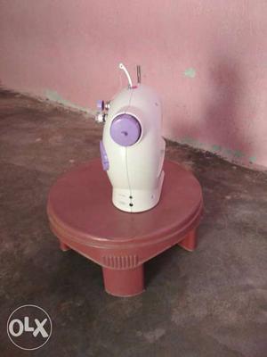 White And Pink Sewing Machine