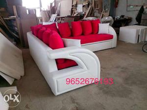 White Leather Based Red Fabric Sofa