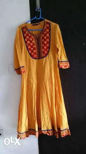 XXL size branded Women's Yellow And Red Kurti.