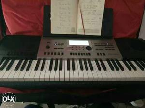 Black And Silver Electronic Keyboard