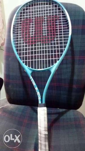 Blue And White Wilson Tennis Racket