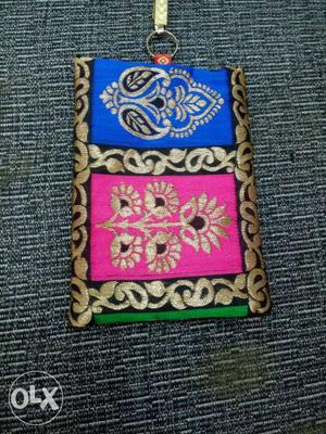 Blue, Black, Brown, And Pink Floral Pouch