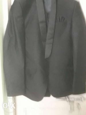 Brand new black tuxedo suit from success,32 inch