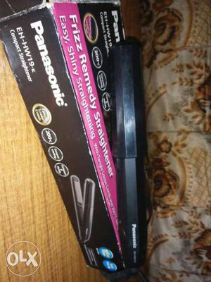 Compact hair straightener used at home,,,with