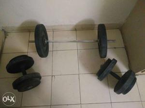 Dumbells, barbell and weights total 40 kg. Dumbells with