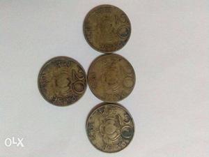 Four Silver And Gold Coins