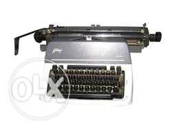 Gray And Black Godrej Typewriter