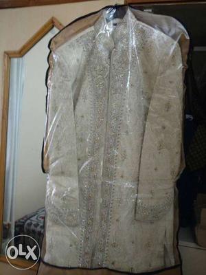 It's a grooms sherwani, purchased in  but wore only