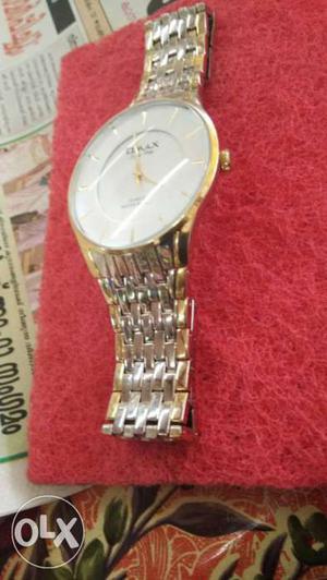 Omex steel and gold watch goodlooking