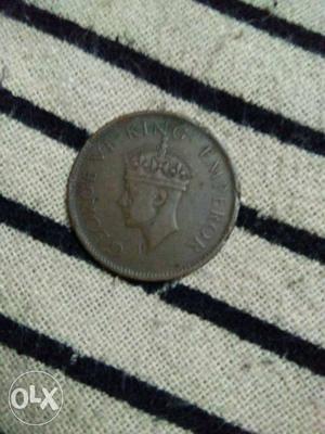 One quarter anna  yyear very rear coin