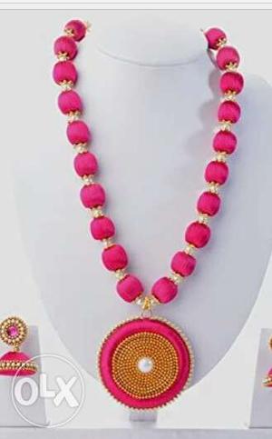 Pair Of Pink Jhumkas And Necklace