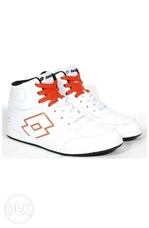 Pair Of White-and-orange Lotto Mid-cut Sneakers