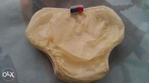 Plastic elastic diapers with cotton rich terry
