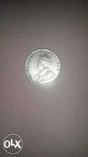 Profile Embossed Round Silver Coin