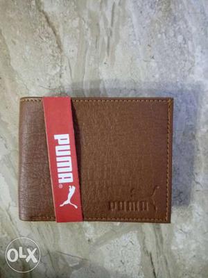 Puma unused wallet. 300 fixed. U need to come