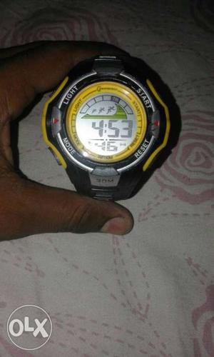 Round Yellow And Black Digital Watch With Black Strap
