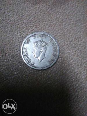 This is a One R.s. Silver Coine during Indias INDIPENDENCE