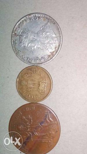 Three Round Silver And Copper Coins