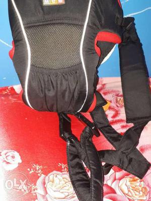 Baby's Black And Red Carrier never used.