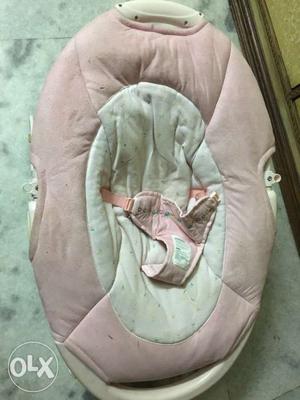 Beige And Pink Bouncer Seat