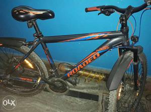 Black And Orange Roaded Hard-tail Bicycle