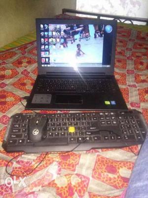 Black Laptop Computer, Mouse, And Keyboard