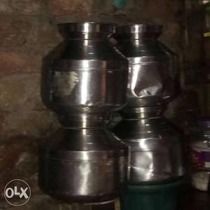Four Stainless Steel Urn