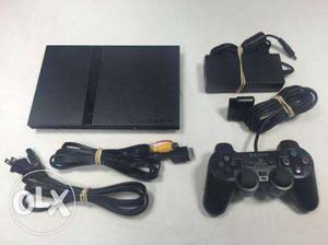 Play station 2 with two controllers and full set
