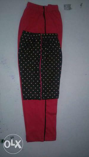 Red Sweatpants And Black-and-white Polka-dotted Shorts