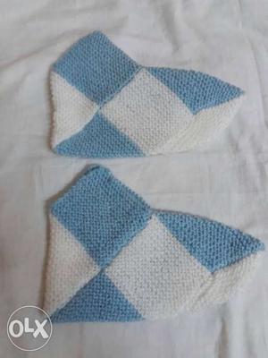 Two White And Blue Knit Boot
