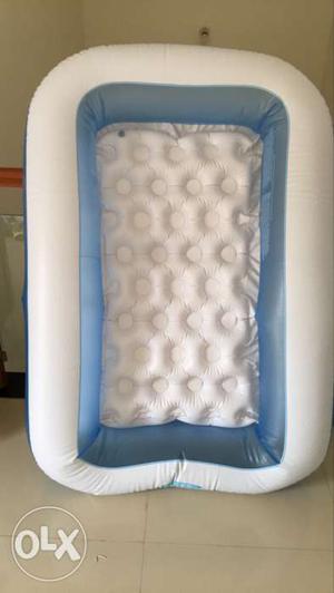 White And Blue Inflatable Pool