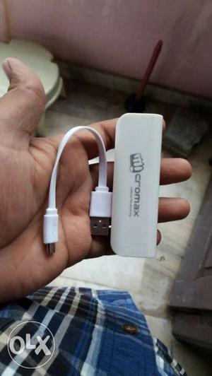 White Micromax Power Bank And USB Cable