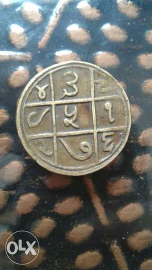 350 years old coin with a picture of shri guru