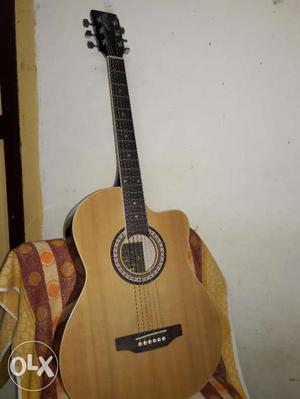 Acoustic Guitar New One for very less price, black n brown