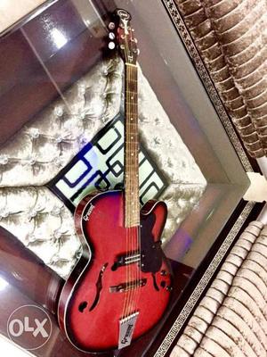 Acoustic, Semi Electric Grason Red Guitar with wire.